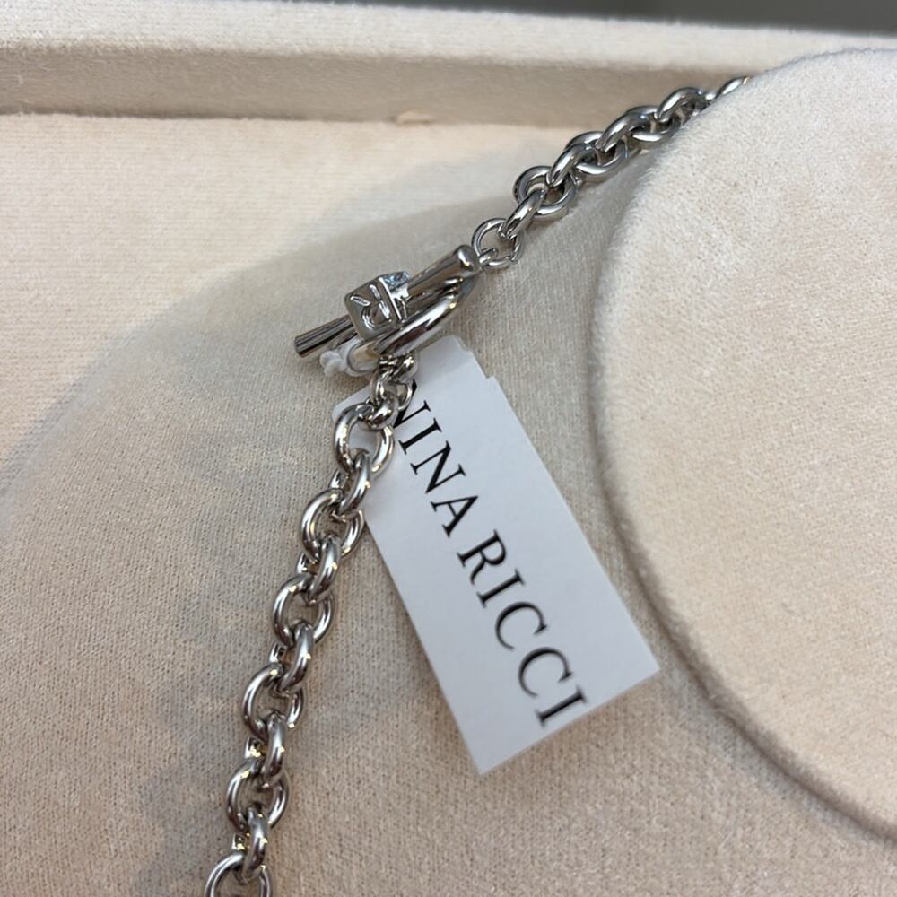 Nina Ricci Rhodium Plated Crystal Charm Necklace Heart Cross Star Horseshoe - Picture 4 of 4
